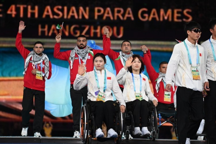 Athletes parade during the closing ceremony of the 4th Asian Para Games in Hangzhou, east China's Zhejiang Province, Oct. 28, 2023. (Xinhua/Jiang Han)