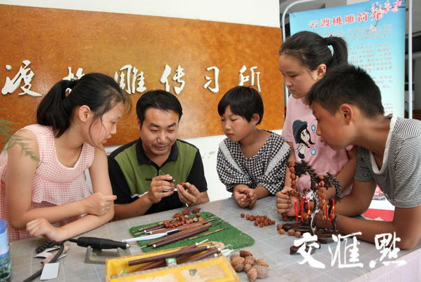 泗阳云渡桃雕传习所