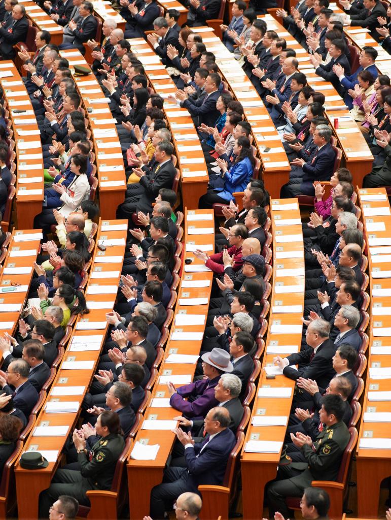 3月10日，中国人民政治协商会议第十四届全国委员会第二次会议在北京人民大会堂举行闭幕会。
新华社记者 王建华 摄