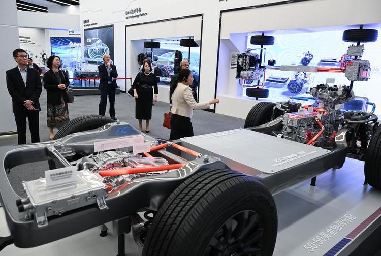 Foreign guests visit an exhibition hall of the headquarters of BYD in Shenzhen, south China's Guangdong Province, July 22, 2024. (Xinhua/Li He)
